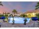 Stunning pool with decorative accents and water features at 14316 W Circle Ridge Dr, Sun City West, AZ 85375