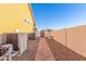 Side yard with brick pathway, leading to gated access at 14316 W Circle Ridge Dr, Sun City West, AZ 85375