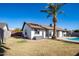 Landscaped backyard features a pool and grassy area at 1437 W Ross Ave, Phoenix, AZ 85027