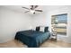 Spacious bedroom with a king-size bed and window coverings at 1437 W Ross Ave, Phoenix, AZ 85027