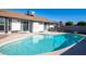 Relaxing kidney-shaped pool in sunny backyard at 1437 W Ross Ave, Phoenix, AZ 85027