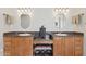 Bathroom with double vanity, granite countertop and large mirrors at 15212 N Palmetto Ln, Fountain Hills, AZ 85268