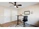 Home office with standing desk and double door closet at 15212 N Palmetto Ln, Fountain Hills, AZ 85268