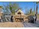 Stunning outdoor kitchen with pizza oven and grill, perfect for entertaining at 15212 N Palmetto Ln, Fountain Hills, AZ 85268