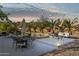 Poolside patio with string lights, creating an inviting ambiance at 15212 N Palmetto Ln, Fountain Hills, AZ 85268