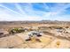 Wide aerial view showing house and surrounding desert landscape at 1529 S 357Th Ave, Tonopah, AZ 85354