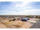 Aerial view showing house, RV, and surrounding desert landscape at 1529 S 357Th Ave, Tonopah, AZ 85354