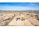 Aerial view showcasing a single-story house in a desert setting at 1529 S 357Th Ave, Tonopah, AZ 85354