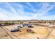 Aerial view of house, RV, and surrounding desert landscape at 1529 S 357Th Ave, Tonopah, AZ 85354