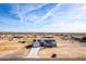 Aerial view of house with solar panels and desert landscape at 1529 S 357Th Ave, Tonopah, AZ 85354