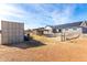 Spacious backyard with storage container and solar panels at 1529 S 357Th Ave, Tonopah, AZ 85354