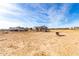 Empty lot behind house with RV and corral at 1529 S 357Th Ave, Tonopah, AZ 85354