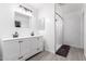 Modern bathroom with double vanity and shower at 1529 S 357Th Ave, Tonopah, AZ 85354