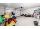 Garage with shelving and storage for tools and equipment at 1529 S 357Th Ave, Tonopah, AZ 85354