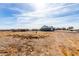 Empty land near a house, ideal for expansion at 1529 S 357Th Ave, Tonopah, AZ 85354