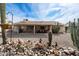 Large backyard with gravel landscaping and desert plants at 1532 Leisure World --, Mesa, AZ 85206