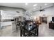 Kitchen and dining area with breakfast bar and seating for four at 1532 Leisure World --, Mesa, AZ 85206