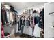 Large walk-in closet with ample hanging and shelving space at 1532 Leisure World --, Mesa, AZ 85206