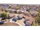 Aerial view of a neighborhood with a tan house at 15365 W Caribbean Ln, Surprise, AZ 85379