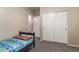 Cozy bedroom with carpet flooring and convenient closet space at 163 W Dragon Tree Ave, Queen Creek, AZ 85140
