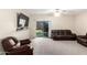 The living room has carpet floors and sliding door access to the backyard at 163 W Dragon Tree Ave, Queen Creek, AZ 85140