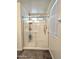 Bathroom with walk-in shower and modern finishes at 16425 W Latham St, Goodyear, AZ 85338