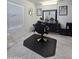 Well-equipped beauty salon with styling station and ample storage at 16425 W Latham St, Goodyear, AZ 85338