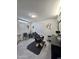 Home salon with styling chair and vanity area at 16425 W Latham St, Goodyear, AZ 85338