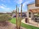 Landscaped backyard with artificial turf and pergola at 16833 S 177Th Ln, Goodyear, AZ 85338