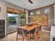 Bright dining area with wooden table and patio access at 16833 S 177Th Ln, Goodyear, AZ 85338