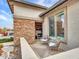 Relaxing patio area with two chairs and a small table at 16833 S 177Th Ln, Goodyear, AZ 85338