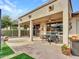 Spacious flagstone patio with seating area and lush landscaping at 16833 S 177Th Ln, Goodyear, AZ 85338