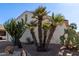 Single story home with desert landscaping and white garage at 1823 E Riviera Dr, Chandler, AZ 85249