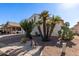 Single story home with desert landscaping and white garage at 1823 E Riviera Dr, Chandler, AZ 85249