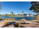 Serene lake view adjacent to a welcoming clubhouse at 1823 E Riviera Dr, Chandler, AZ 85249