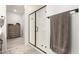 Bathroom with walk-in shower and storage at 1852 E Chelsea Ln # 102, Gilbert, AZ 85295