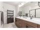 Modern bathroom with double vanity and walk-in shower at 1852 E Chelsea Ln # 102, Gilbert, AZ 85295