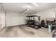 Spacious garage with golf cart and extra storage at 1852 E Chelsea Ln # 102, Gilbert, AZ 85295