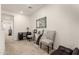 Bright hallway with seating area and view to living room at 1852 E Chelsea Ln # 102, Gilbert, AZ 85295