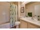 Bathroom with shower/tub combo and updated vanity at 18619 N 136Th Dr, Sun City West, AZ 85375