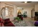 Living room with view into kitchen and dining area at 18619 N 136Th Dr, Sun City West, AZ 85375