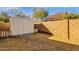 Backyard with shed and block wall at 1902 E Bruce Ave, Gilbert, AZ 85234