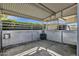 Clean horse stall with metal walls and feed troughs at 1902 E Bruce Ave, Gilbert, AZ 85234