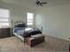 Bedroom with carpeted floor and a double bed at 19203 N Marbella Ave, Maricopa, AZ 85138