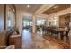 Open entryway leading to living and dining areas with hardwood floors at 19334 W Pasadena Ave, Litchfield Park, AZ 85340