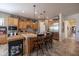 Spacious kitchen with island and stainless steel appliances at 19334 W Pasadena Ave, Litchfield Park, AZ 85340