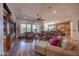 Relaxing living room with hardwood floors and views to kitchen at 19334 W Pasadena Ave, Litchfield Park, AZ 85340