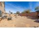 Backyard with basketball hoop and patio furniture at 2016 N Ensenada Ln, Casa Grande, AZ 85122