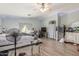 Spacious main bedroom with a ceiling fan and wood-look floors at 2016 N Ensenada Ln, Casa Grande, AZ 85122