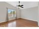 Spacious bedroom with large window and wood floors at 2023 E Glenhaven Dr, Phoenix, AZ 85048